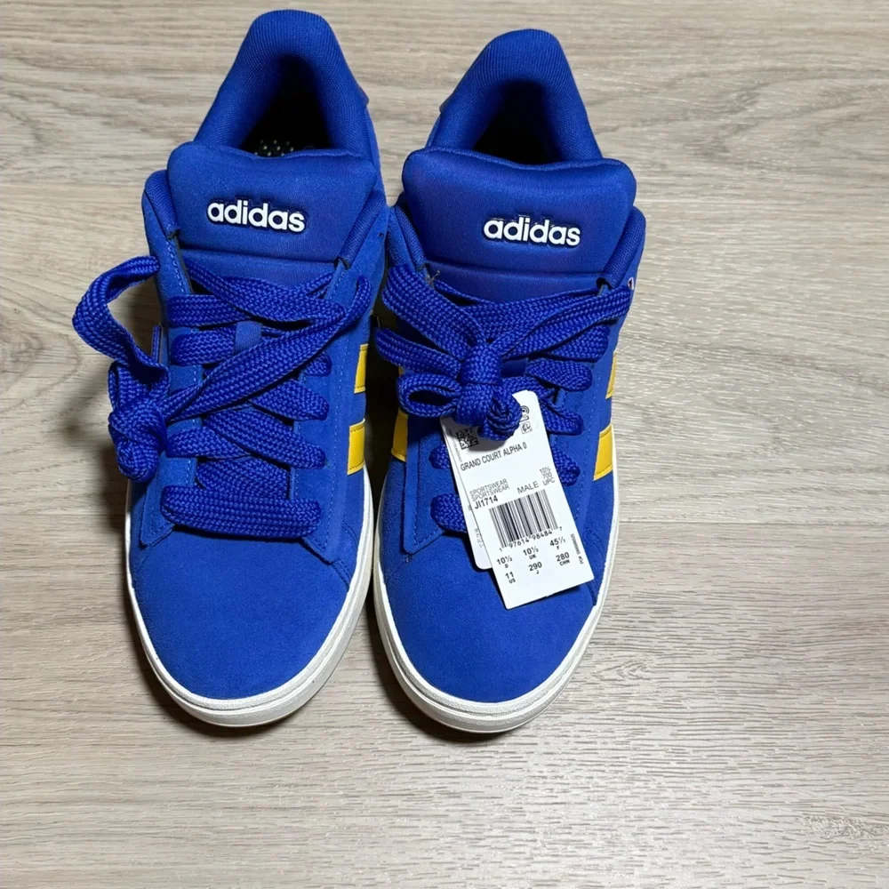 Adidas Blue Sneakers with Yellow Accents
